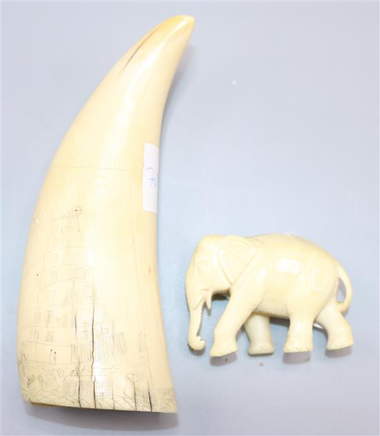 A Scrimshaw whales tooth, ivory elephant figure
